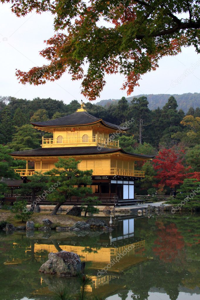 Kinkakuji in autumn season - the famous Golden Pavilion at Kyoto, Japan.