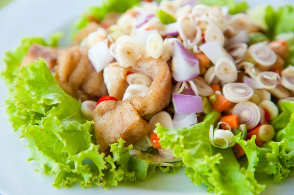 Thai dressed spicy salad with bass, green herbs and nuts : delicious food — Stock Photo, Image