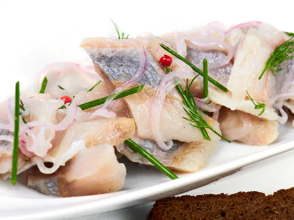 Herring pieces of salt fillet — Stock Image Herring pieces of salt fillet Royalty Free Stock Photos