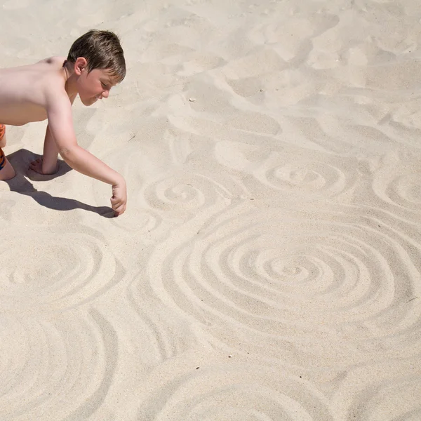 Sandy spirals background and its designer — Stock Photo, Image