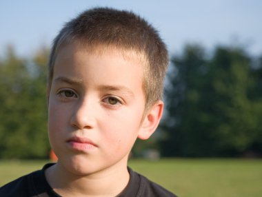 Outdoor portrait of a small boy clipart
