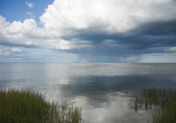 stock image Rain clouds and rainbow over northern sea (Kattegat, part of Bal