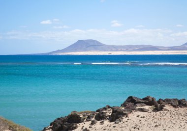 View from Isla de Lobos towards Fuerteventura, Corralejo sand du clipart