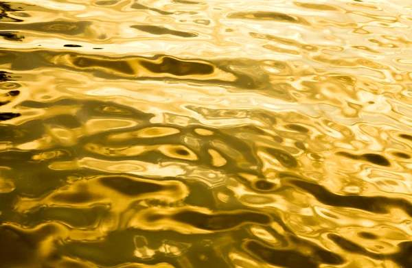 Golden liquid background — Stock Photo, Image