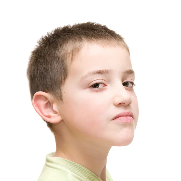 Haughty face, little boy poses against white background — Stock Photo ...