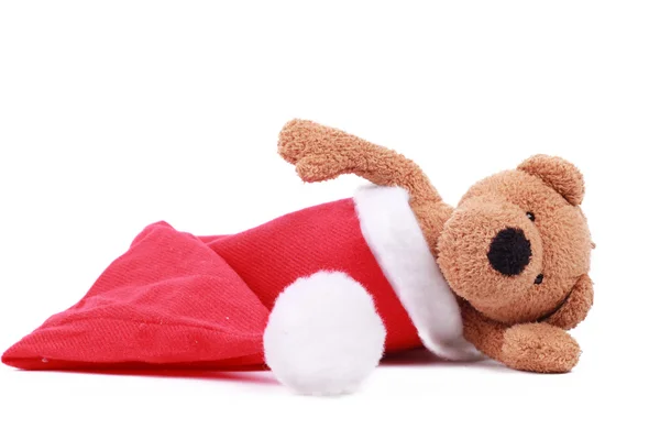 Toy bear in santa's hat — Stock Photo, Image