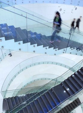 inside a modern building (color toned image; motion blurr clipart