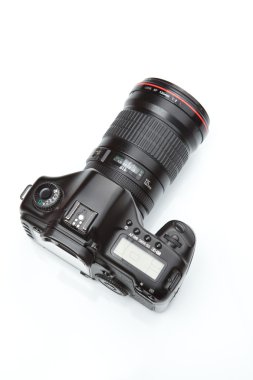 Modern DSLR with a telephoto lens clipart