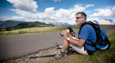 Photographer with a camera and a telephoto lens clipart