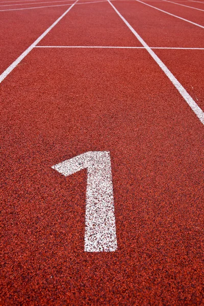 Spor zemin kavramı - Atletizm lane numaraları takip. — Stok fotoğraf