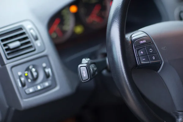 Modern car interior - detail of the steering wheel — Stock Photo, Image