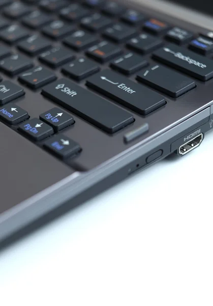 Close-up view of a modern hi-end carbon laptop computer with a H — Stock Photo, Image
