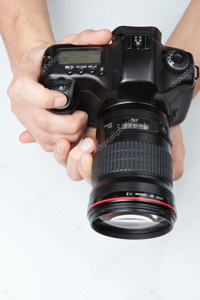 Modern DSLR with a telephoto lens