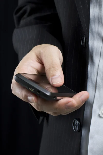 stock image Business man using smart cell phone