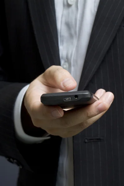 Business man using smart cell phone — Stock Photo, Image