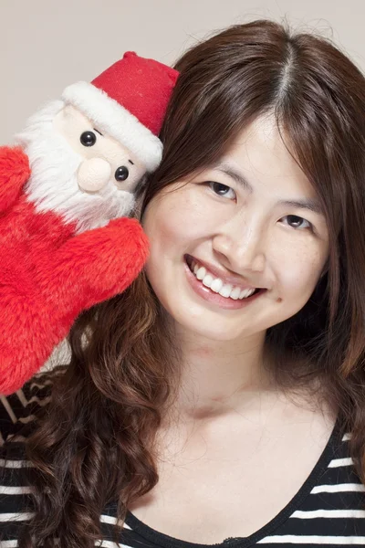 Christmas celebration by asian woman — Stock Photo, Image