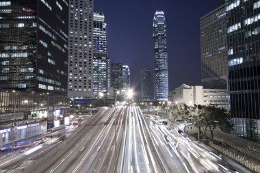 Traffic in Hong Kong downtown at night clipart