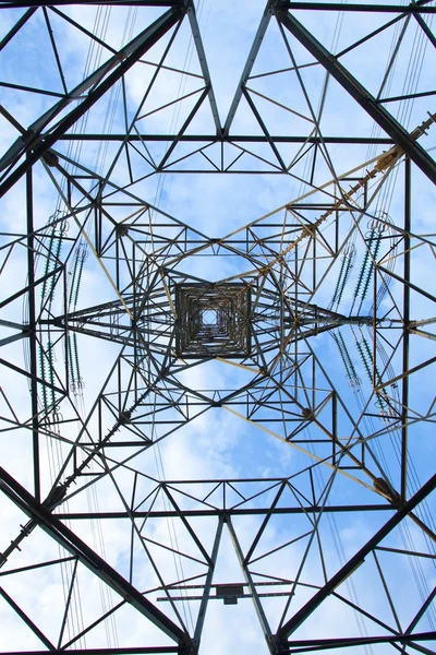 Electrical tower over a blue sky background — Stock Photo, Image