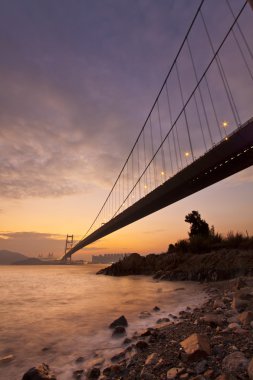 Tsing Ma Bridge at sunset time clipart