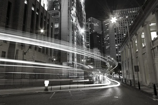 Traffic in city at night in black and white toned — Stock Photo, Image