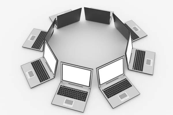 Laptops in circle isolated on white — Stock Photo, Image