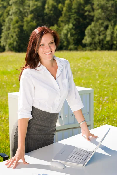 Businesswoman in sunny nature office smile — Stock Photo, Image