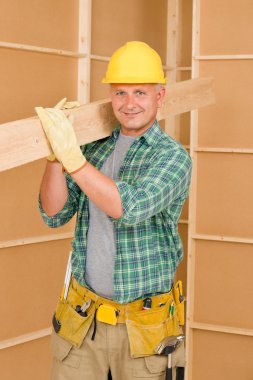 Handyman carpenter mature carry wooden beam clipart