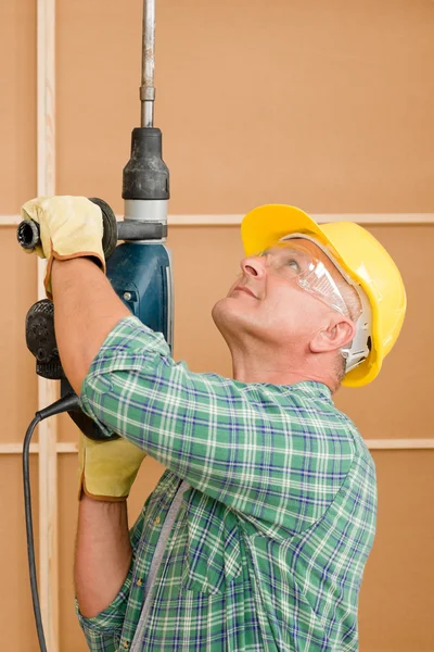 Handyman home improvement working with jackhammer — Stock Photo, Image