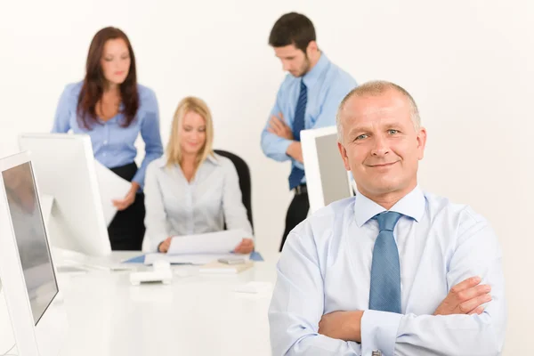 Business team senior manager with work colleagues — Stock Photo, Image
