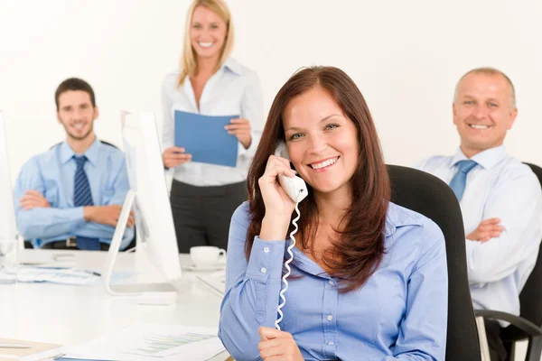 Business team pretty businesswoman calling phone — Stock Photo, Image