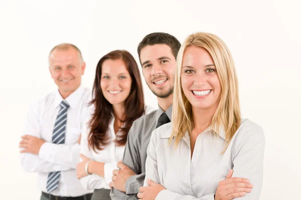 Business team happy stående i rad porträtt Stockbild