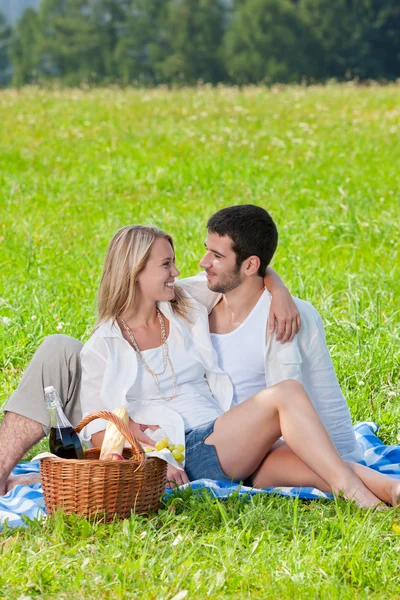 Picnic - Romantic couple in sunny meadows — Stock Photo, Image