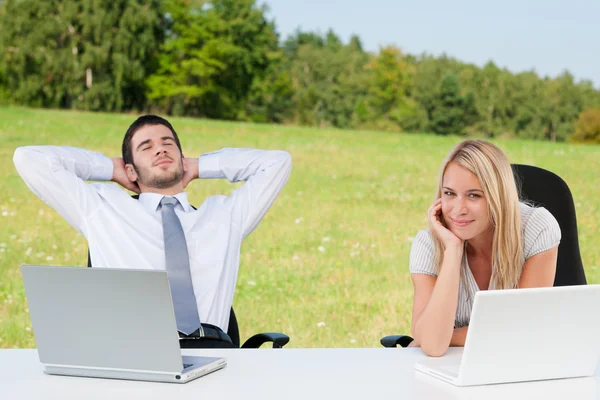 Business colleagues in nature with laptop relax — Stock Photo, Image