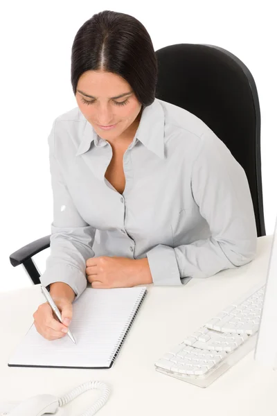 Mujer de negocios exitosa en la oficina con bloc de notas —  Fotos de Stock