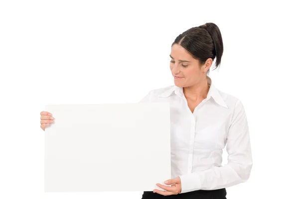 Happy businesswoman looking aside empty banner — Stock Photo, Image