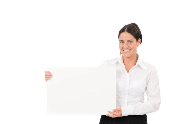 Happy businesswoman holding aside empty banner — Stock Photo, Image
