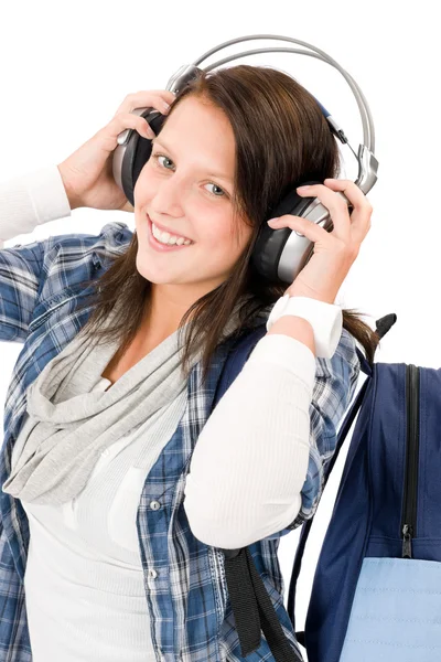 Leende kvinna tonåring njuta av musik hörlurar — Stockfoto