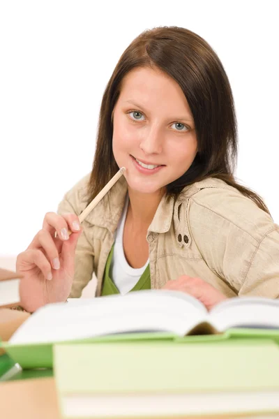 Uczeń nastolatek dziewczyny pisać pracę domową z książki — Zdjęcie stockowe