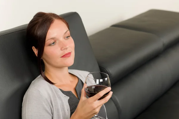 Elegant businesswoman sit leather sofa drink wine — Stock Photo, Image