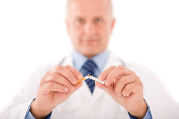 Stop smoking mature male doctor break cigarette Stock Photo