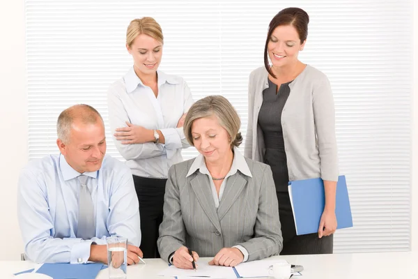Business team pretty businesswomen with colleagues — Stock Photo, Image