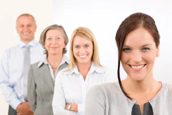 Business team happy standing in line portrait Royalty Free Stock Photos