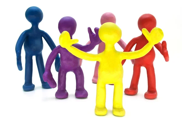 Group of plasticine puppets on white background — Stock Photo, Image