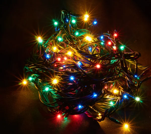 The sparkling Christmas garland — Stock Photo, Image