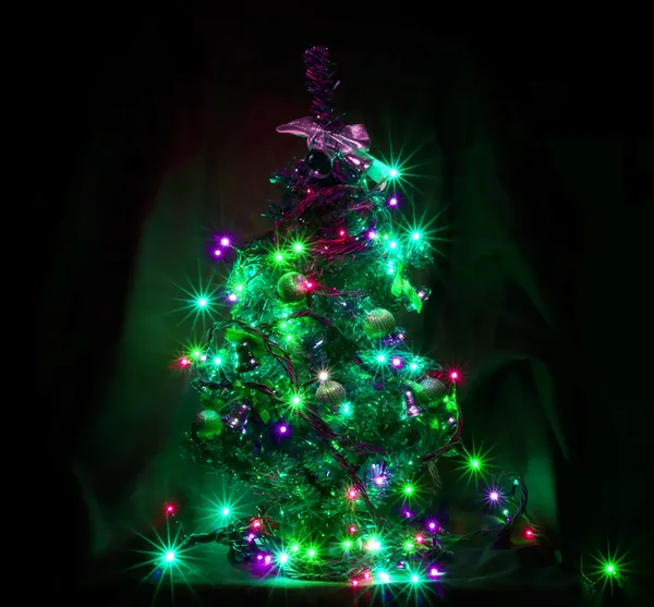 Christmas tree with garlands — Stock Photo, Image