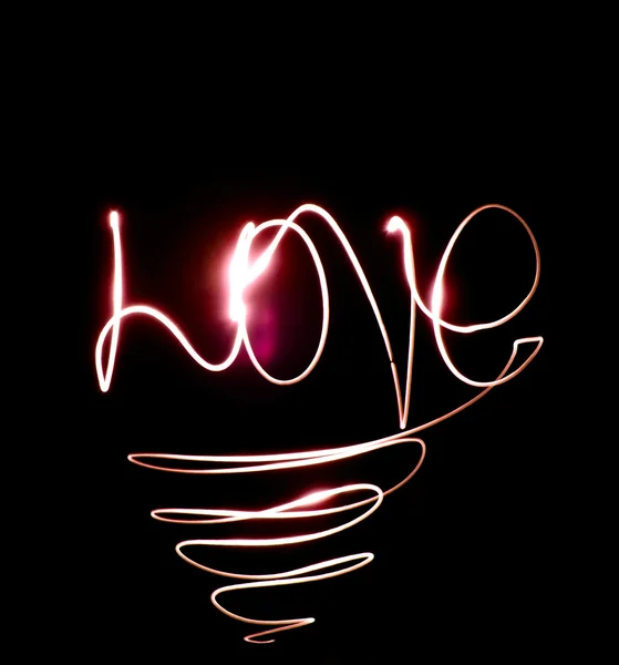 stock image The word love from the lights