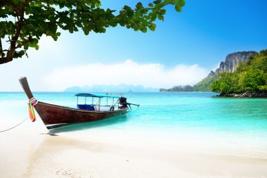 Long boat and poda island in Thailand clipart