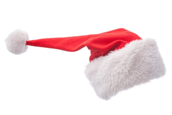 Beyaz zemin üzerine kırmızı santa claus şapka — Stok fotoğraf