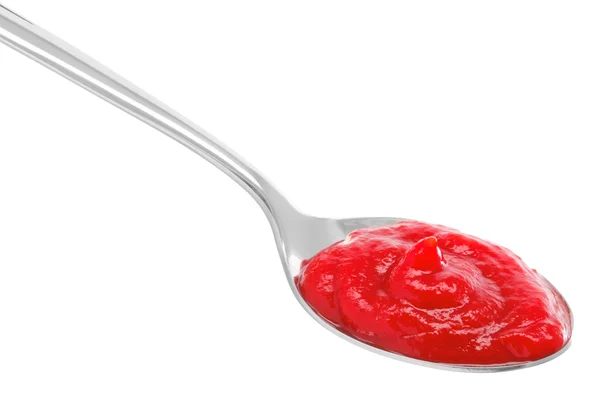 Salsa de tomate en una cuchara —  Fotos de Stock