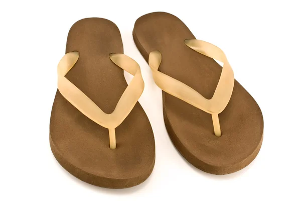 Par av brunt gummi flip flop sandaler — Stockfoto